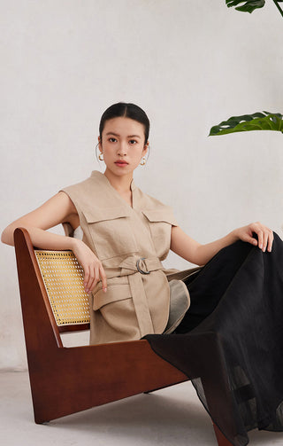 Camel linen sleeveless belted vest with rounded flap pockets and tie waist belt