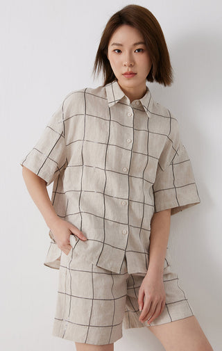 White linen short-sleeve button-up shirt with point collar and dark grid stitch pattern