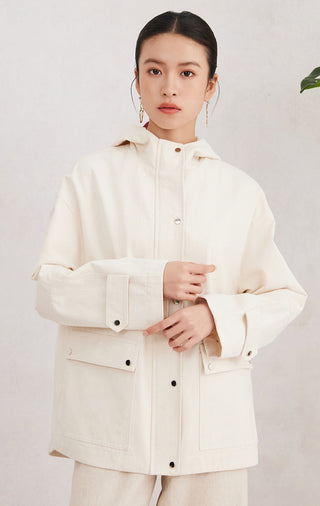 Beige cotton hooded jacket front view with shiny zipper pull and snap placket