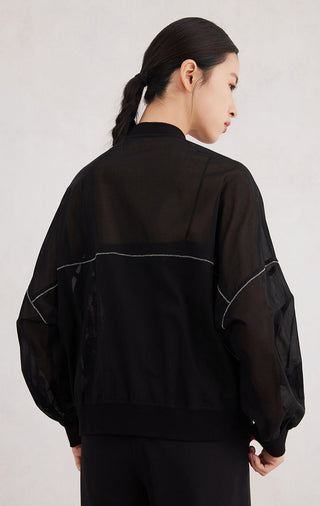Black zip-up hoodie back view, contrast piping across shoulders and upper back