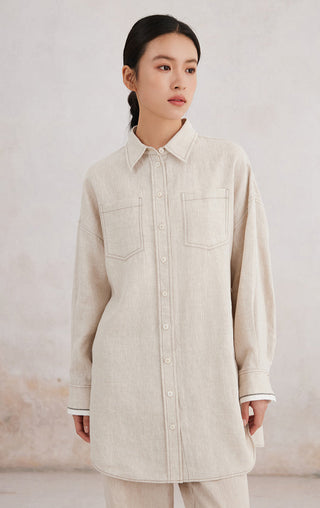 Beige linen button-front shirt with contrast cuffs and chest flap pockets