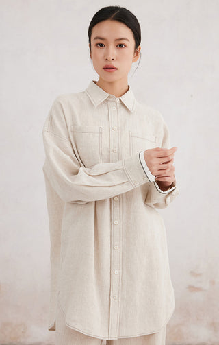 Beige linen button-front shirt, contrast cuff detail and visible front buttons