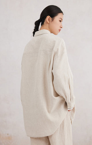 Beige linen button-front shirt, back view with contrast cuff trim