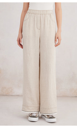 Beige linen wide-leg trousers with elastic waist and full-length drape