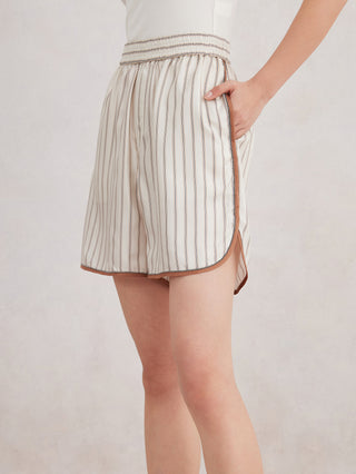 Beige silk striped elastic-waist shorts with gathered waistband and side pocket opening