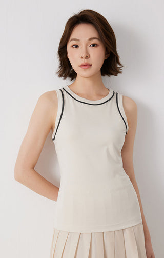 Beige cotton stretch tank top with black-trim crew neckline and sleeveless cut