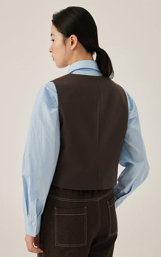 Dark brown wrap vest back view with V-shape seam and shoulder-to-waist cut