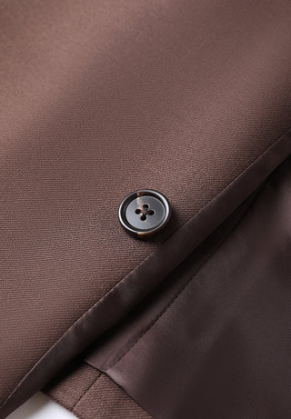 Dark brown vest close-up showing round button and fabric seam on lapel