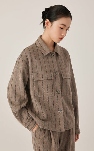 Dark camel knit shirt jacket with vertical stripe texture and button placket, side view