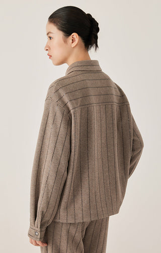 Dark camel stripe knit shirt jacket, back view with button cuffs and stitched shoulders