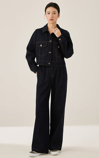 Black/dark wash cotton-blend wide-leg trousers with front button closure.