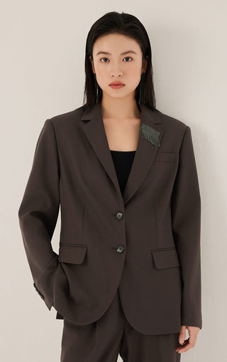 Front view dark brown wool-blend blazer with flap pockets and shimmer fringe detail