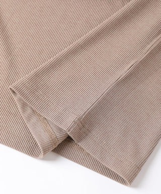 Hem and sleeve cuff detail on brown ribbed knit V-neck top