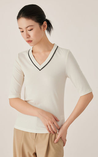 White V-neck knit top with black-edge trim and textured fabric, short sleeves