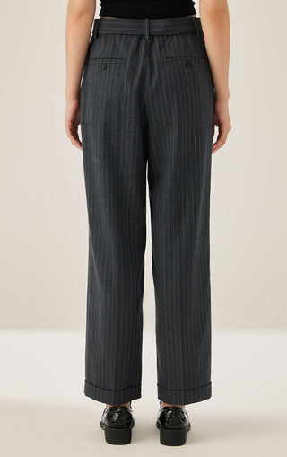 Dark gray pinstripe wool belted pleated pants, back pockets and cuffed legs