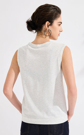 Ivory sleeveless knit tank top, back view with crew neckline and plain back panel