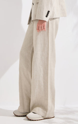Beige trousers with elastic waistband and vertical front seam