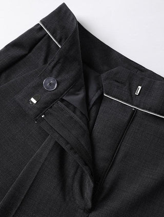 Black blazer-style pants front detail with button, notch lapel-like waistband trim