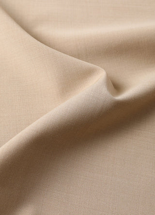 Khaki fabric close-up with subtle texture and gentle crease along the fold.