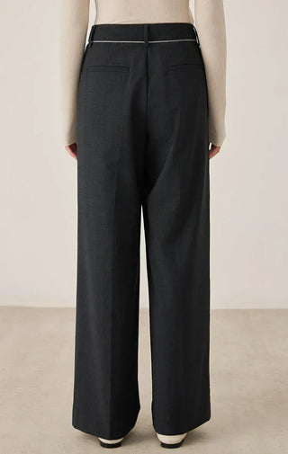Black wide-leg tailored pants, back view with center seam and straight, wide legs