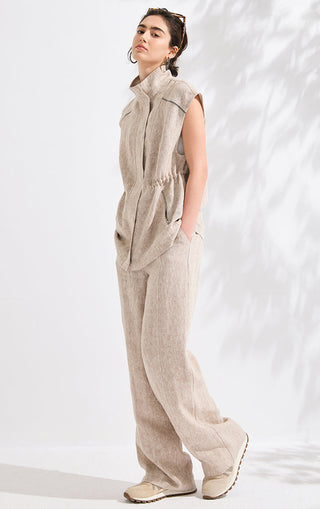 Camel linen vest sleeveless with stand collar and contrast black stitching, styled with pants