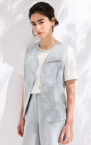 Light blue linen-blend tailored vest with chest pocket and button front