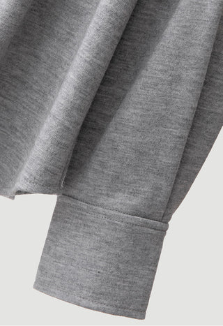 Wool blouse sleeve cuff and hem detail in heather grey
