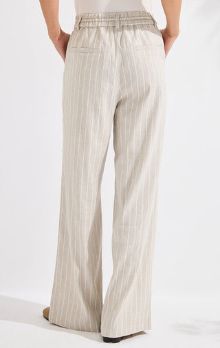 Beige striped relaxed wide-leg pants with elastic waistband and straight, flowing legs