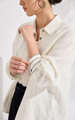 Ivory vertical stripe linen shirt sleeve and cuff with dark trim and beaded accents
