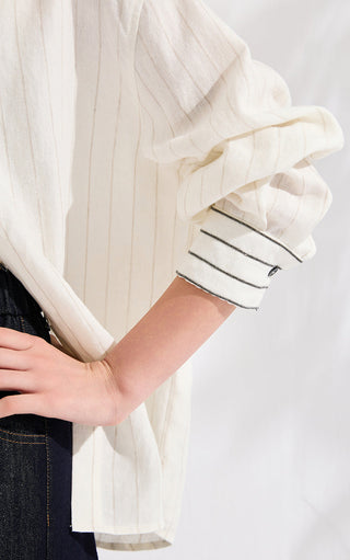 Ivory vertical stripe linen shirt cuff with dark trim and silver-toned beaded detail