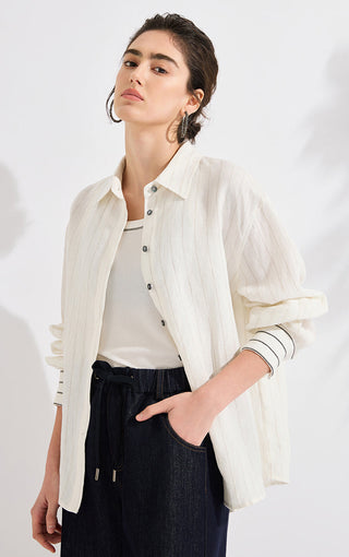 Ivory linen shirt with vertical stripes, pointed collar, and silver beaded button-front