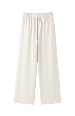 Cream wide-leg pants with relaxed fit and elastic waistband