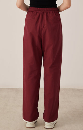 Women’s relaxed drawstring waist pants, deep red color, straight wide-leg fit