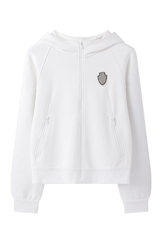 White zip-up hoodie front view with shield crest badge and zipper closure