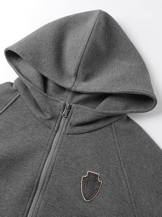 Dark grey zip-up hoodie hood and crest badge on chest