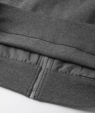 Dark grey hoodie hem with inner lining and zipper pocket seam