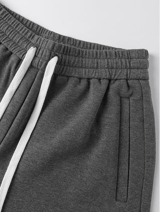 Gray drawstring waistband with stitched pockets and side seam detail
