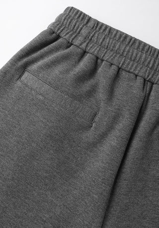 Gray lounge pants front pocket and elastic waistband detail
