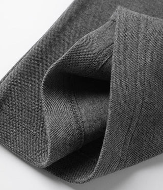Gray pant cuff and inner seam view, showing soft cotton-blend fabric