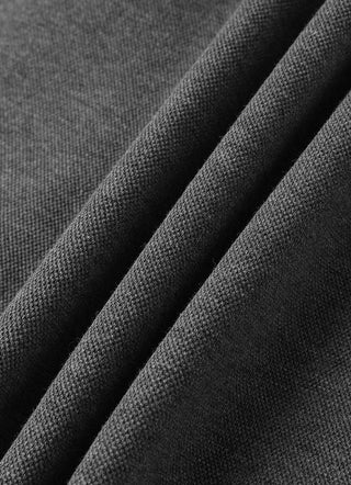 Close-up of gray woven fabric texture on relaxed lounge pants