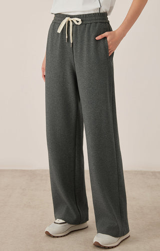 Gray relaxed lounge pants with drawstring elastic waist and drapey wide-leg shape