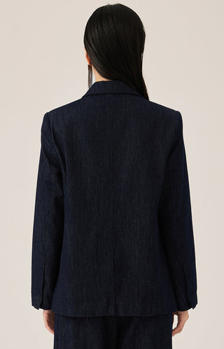 Back view of dark blue tailored blazer with center seam and structured shoulder