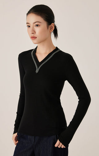 Black ribbed long-sleeve top with V-neck and contrast edging