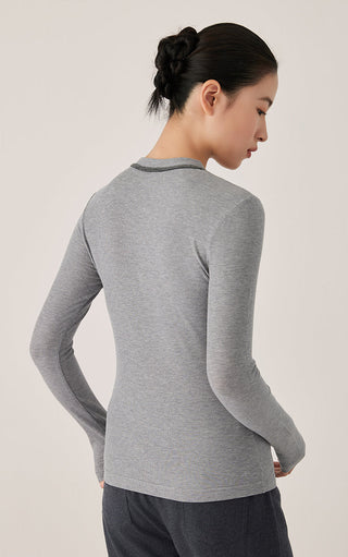 Gray V-neck ribbed knit top, back view, long sleeves