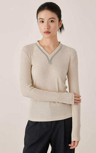 Oatmeal ribbed Tencel-blend top with V-neck trim and long sleeves
