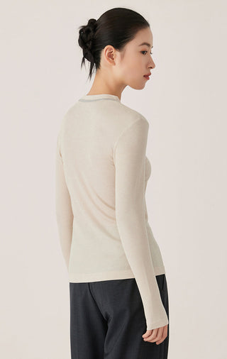 Oatmeal ribbed top with V-neck trim, side/back view