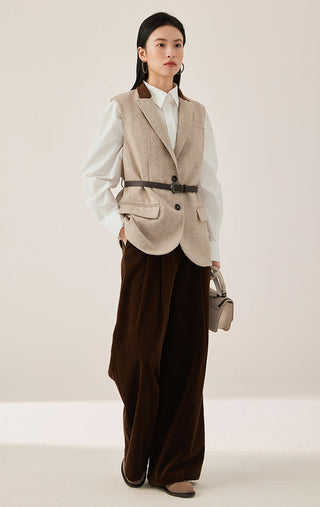 Dark brown corduroy wide-leg pants on model, full-length loose fit