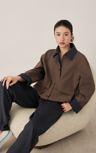 Brown stand-collar jacket front view with button placket and flap pockets