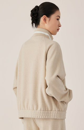 Khaki zip-up track jacket back view with ribbed hem and striped collar detail