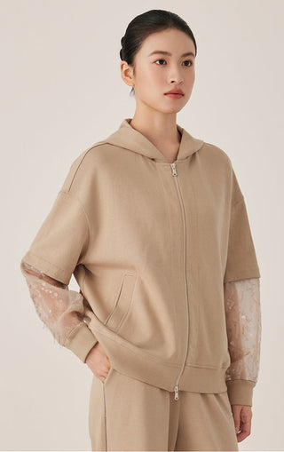 Khaki cotton zip hooded jacket with front pocket and sheer patterned mesh sleeve panels
